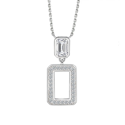 A sterling silver rhodium plated necklace with a cubic zirconia crystal pendant.