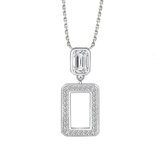 A sterling silver rhodium plated necklace with a cubic zirconia crystal pendant.
